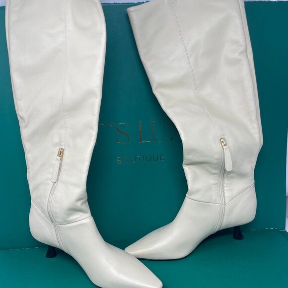 Raye | Jonathan Boot - Picture 2 of 8